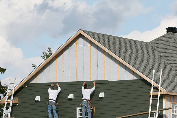 Professional Emergency Siding Repair technician working in Woodstock, MD